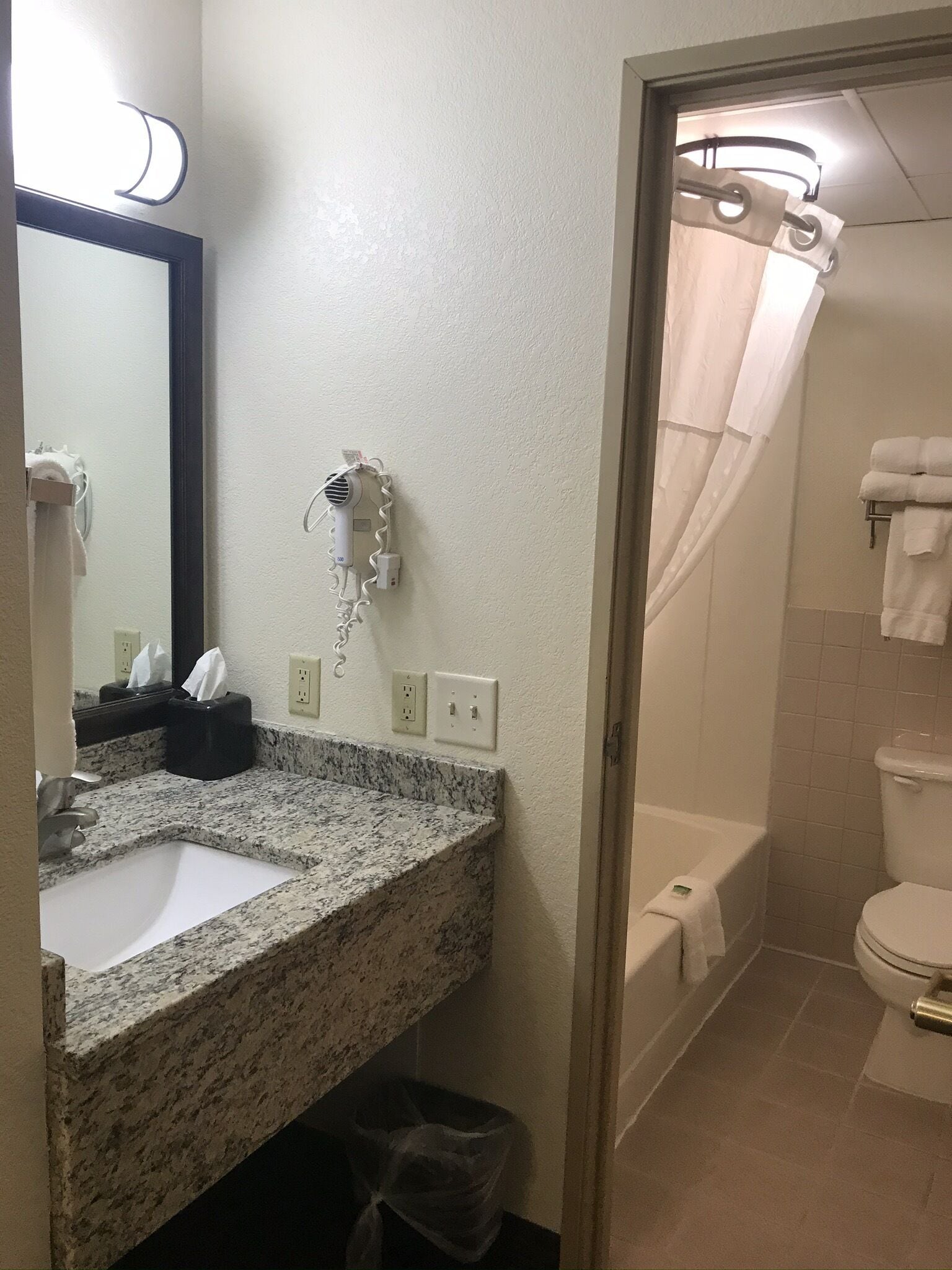 combined shower/bathtub, free toiletries, hair dryer, towels