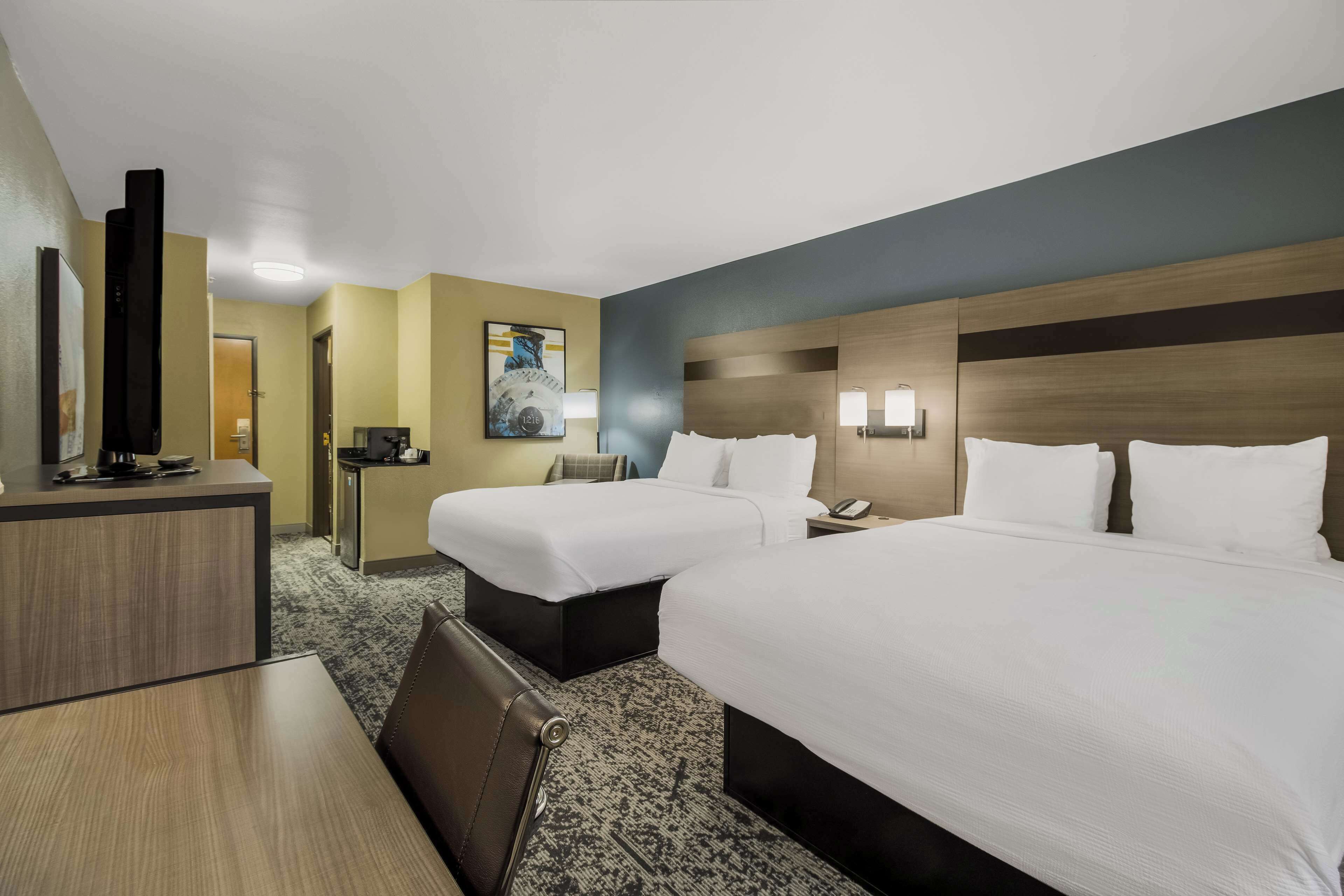 standard room, 2 queen beds, non smoking | 1 bedroom, desk, laptop workspace, blackout curtains