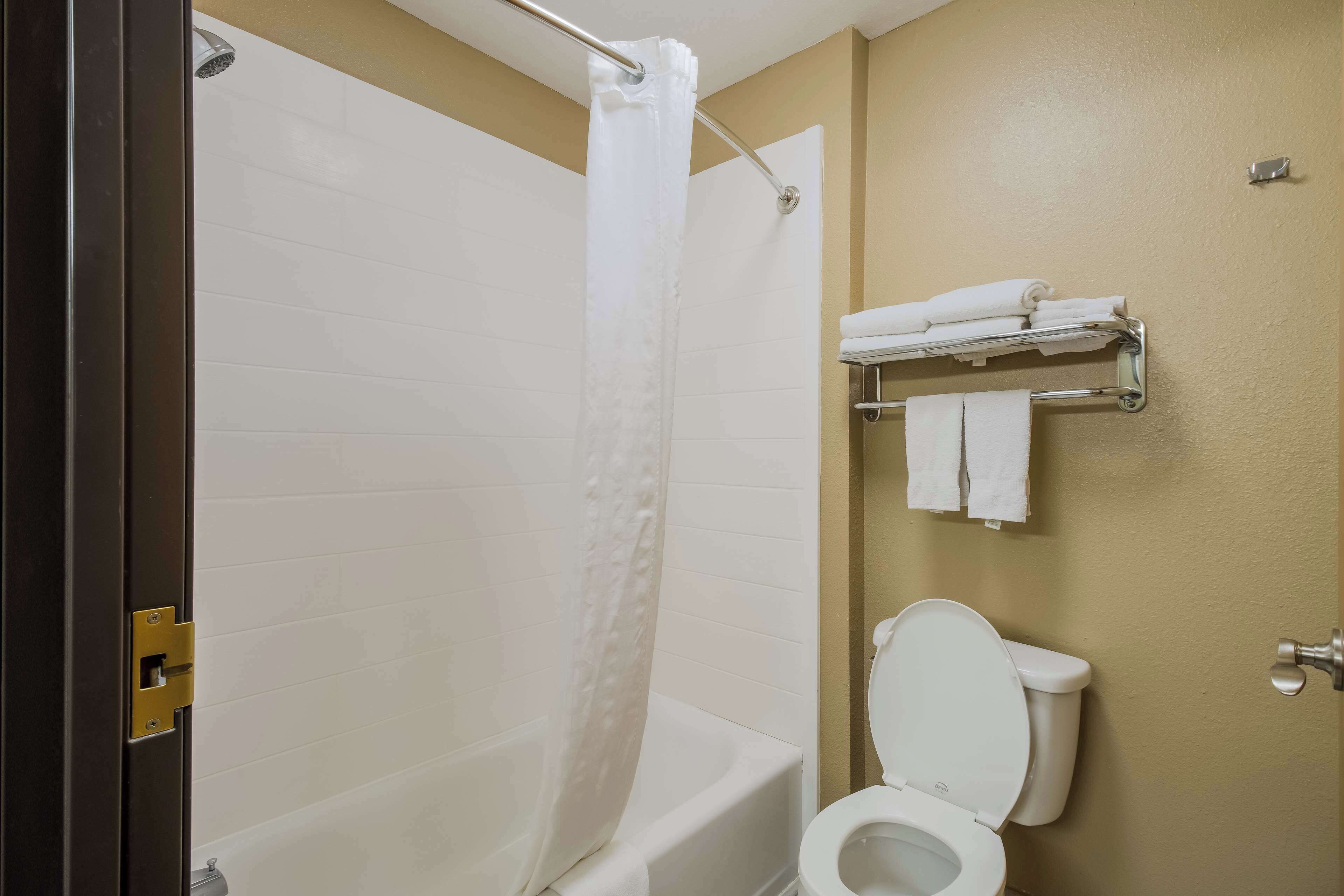 suite, 2 queen beds, non smoking | bathroom | combined shower/bathtub, hair dryer, towels
