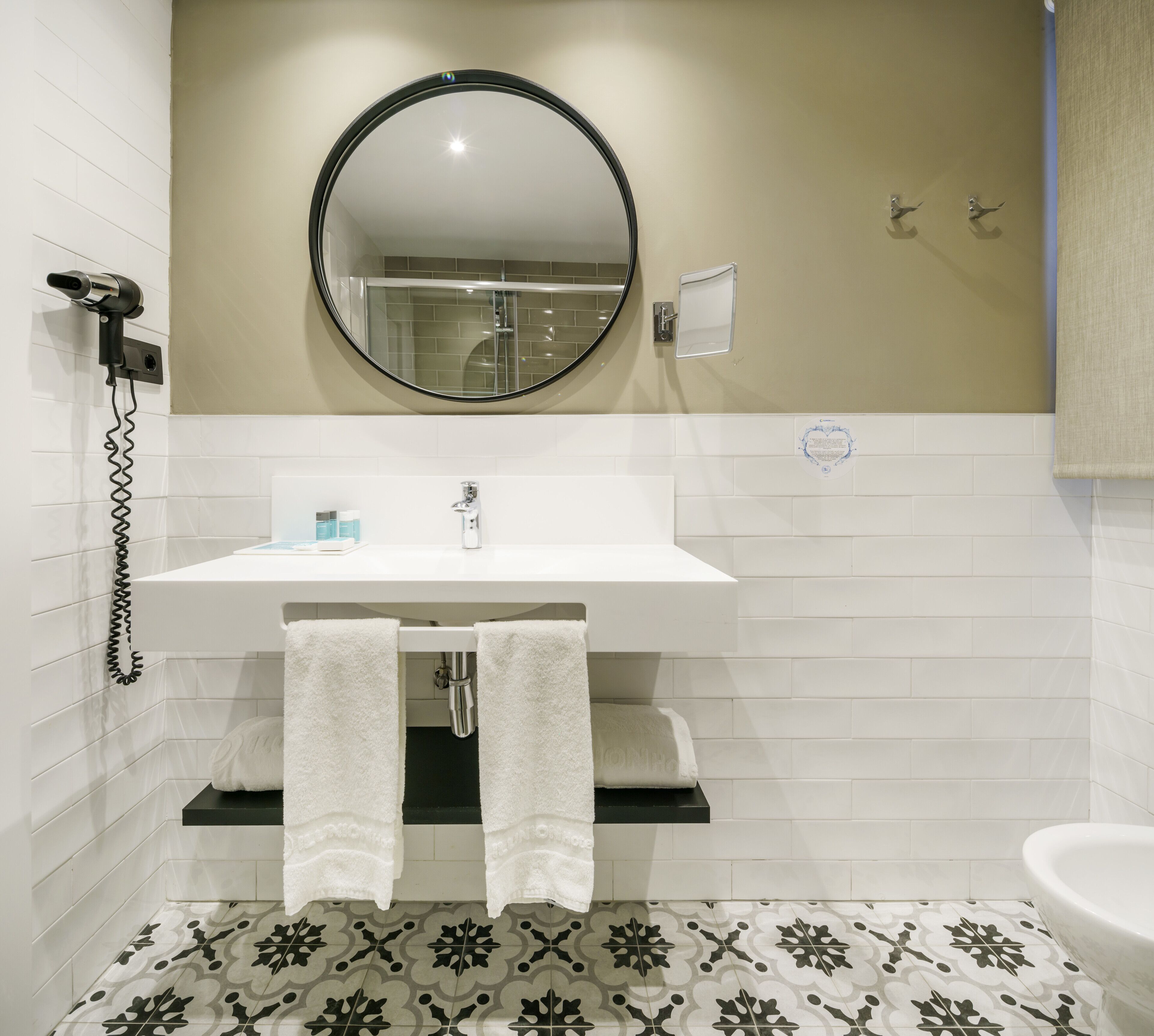 eco-friendly toiletries, hair dryer, bidet, towels