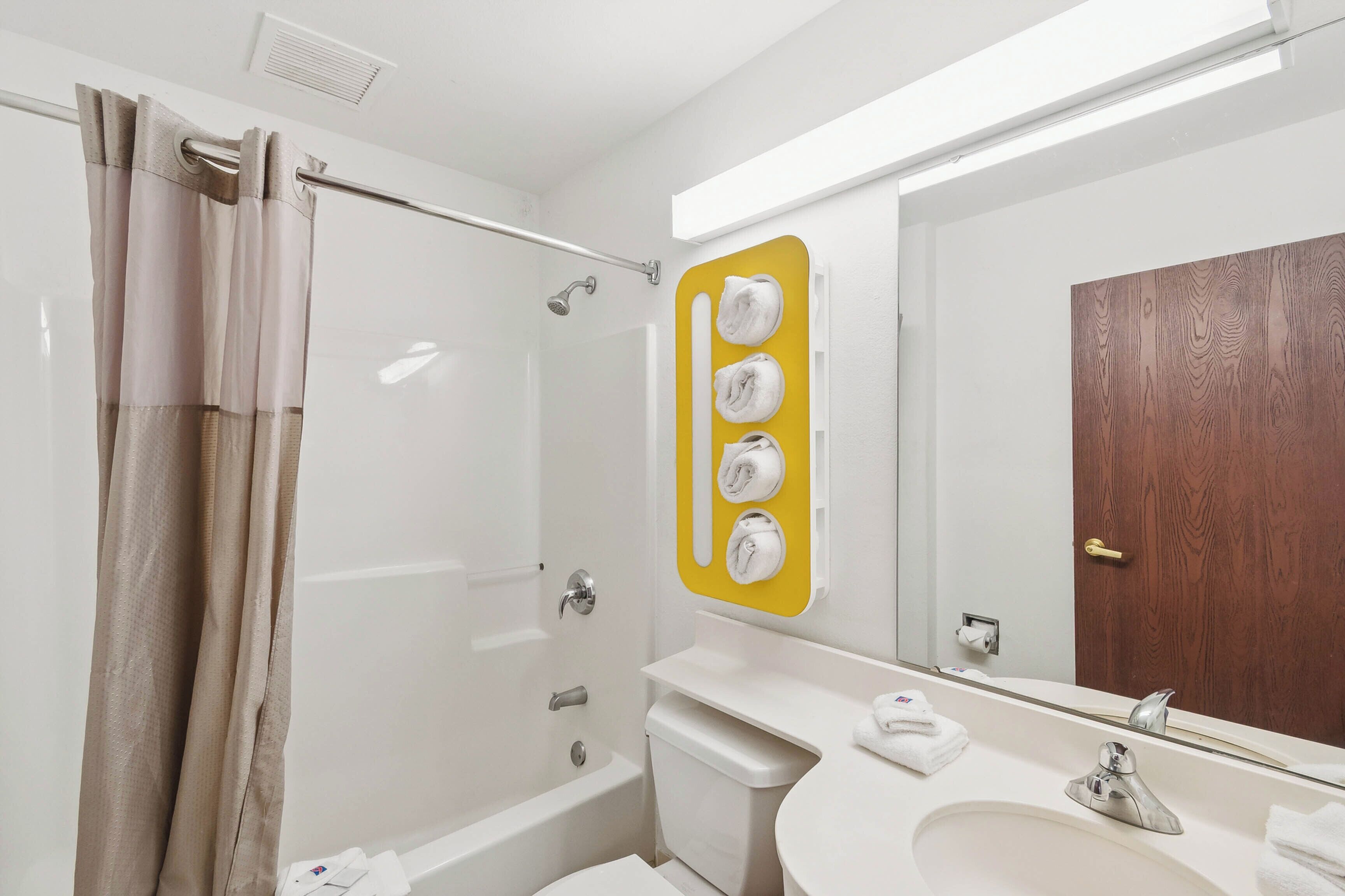 Combined shower/tub, towels, soap, shampoo