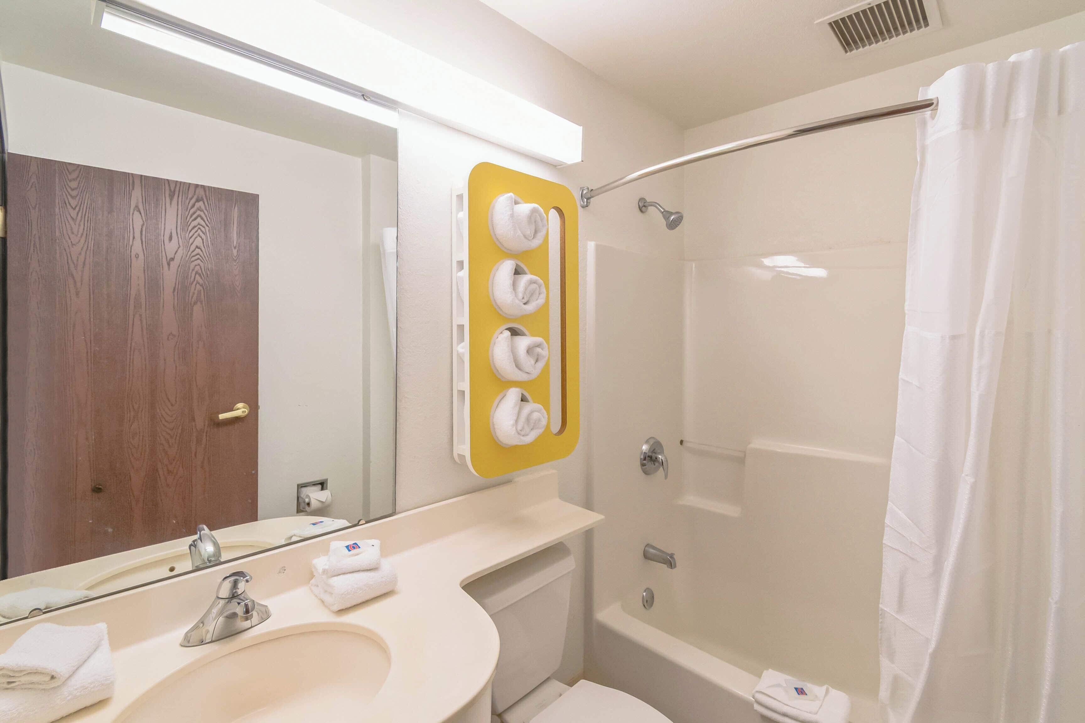 Combined shower/tub, towels, soap, shampoo