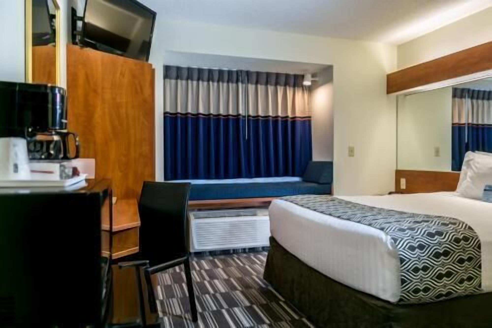 In-room safe, desk, laptop workspace, blackout curtains