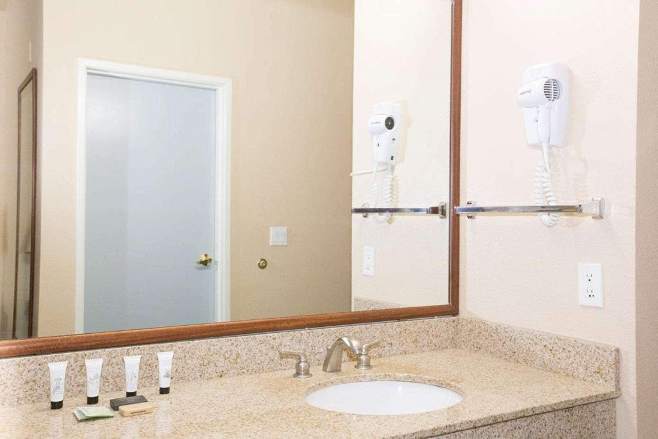 combined shower/bathtub, free toiletries, hair dryer, towels