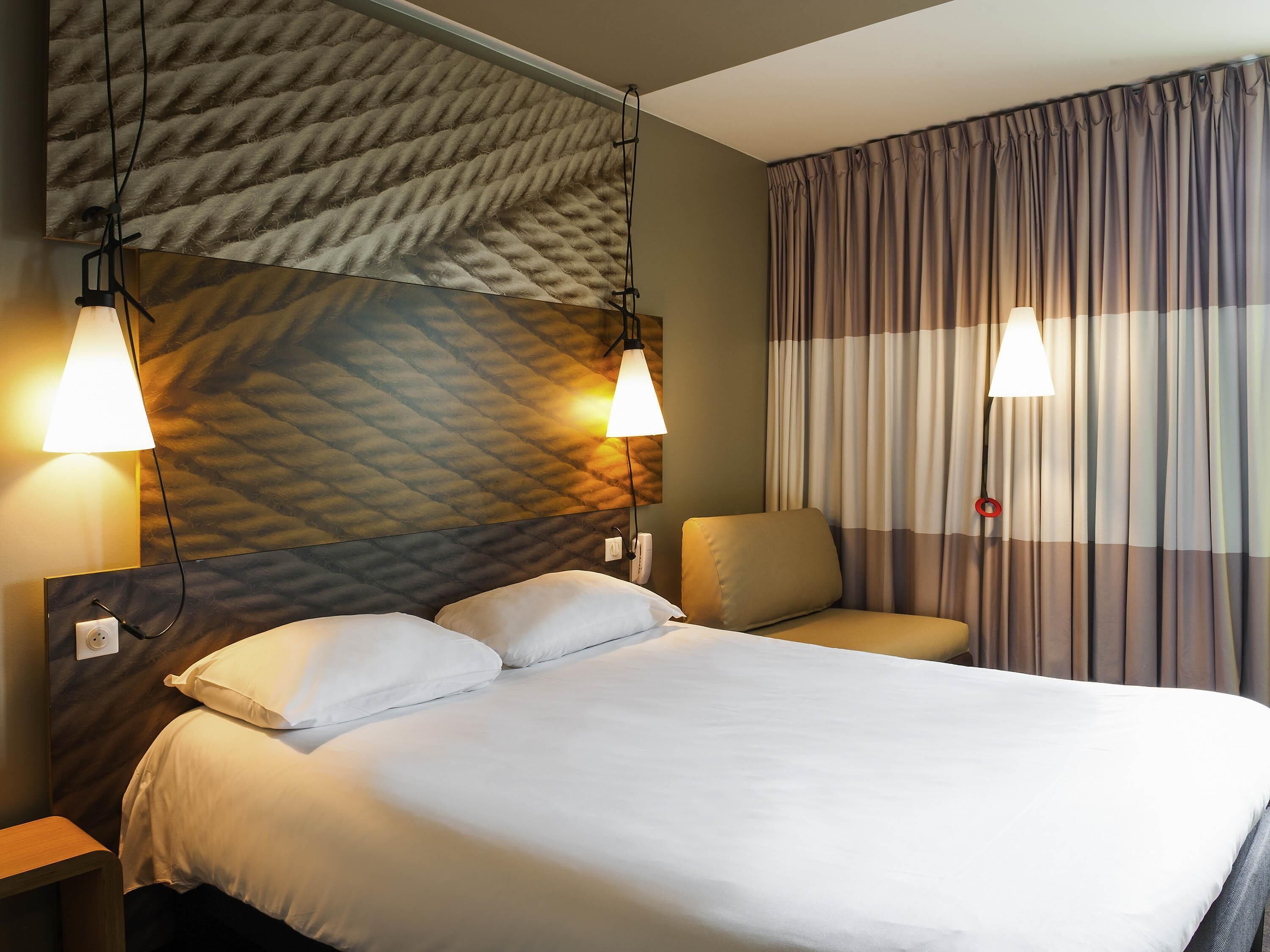 Premium bedding, desk, blackout curtains, soundproofing