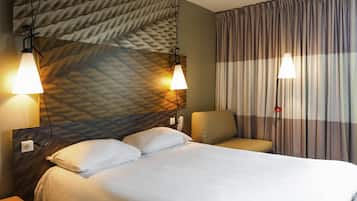 Premium bedding, desk, blackout drapes, soundproofing