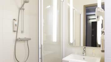 Eco-friendly toiletries, hair dryer, towels