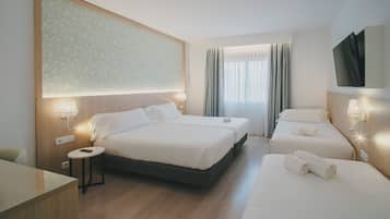 Family Room (2 adults 2 child) | Minibar, in-room safe, desk, soundproofing