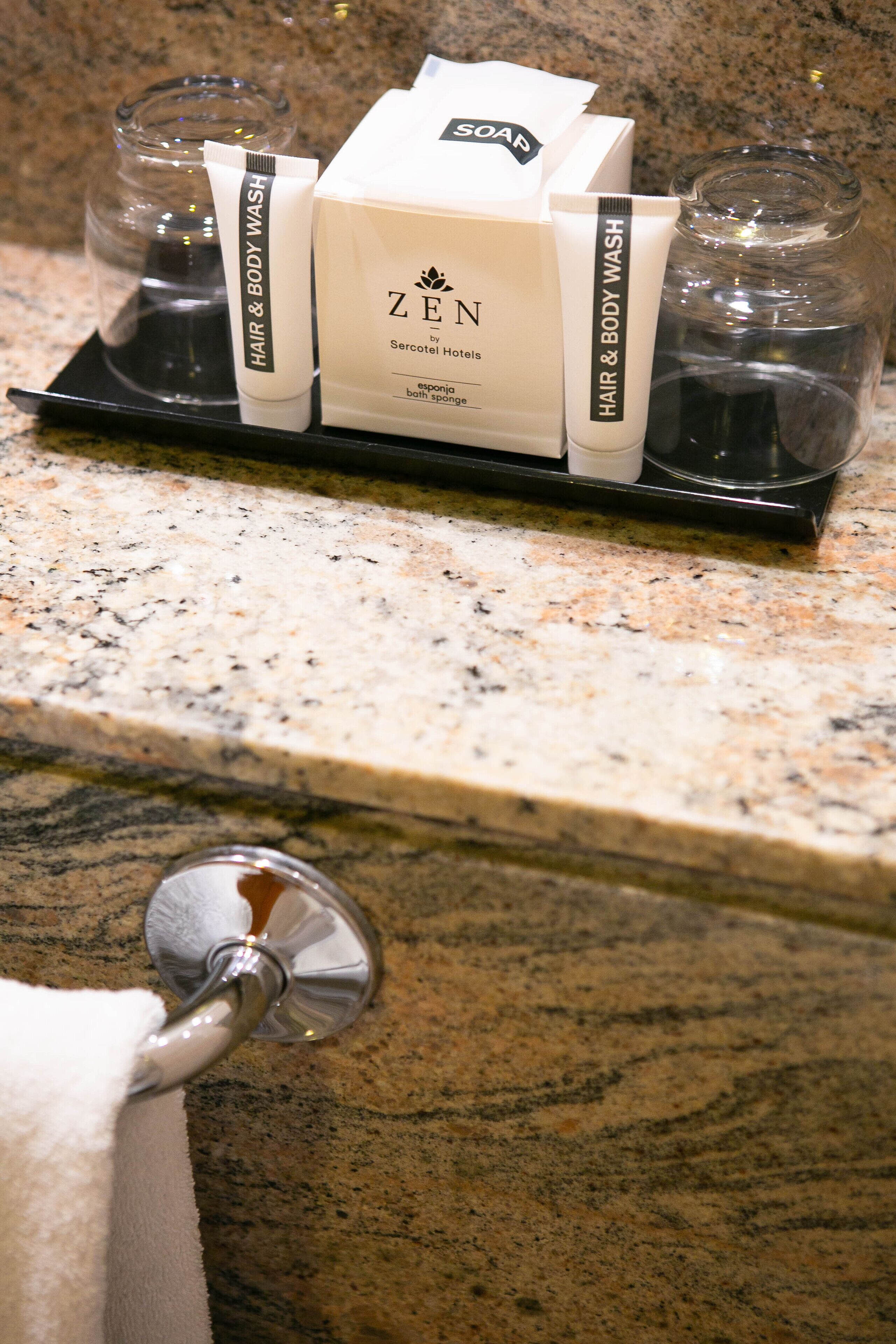 bathtub, free toiletries, hair dryer, towels