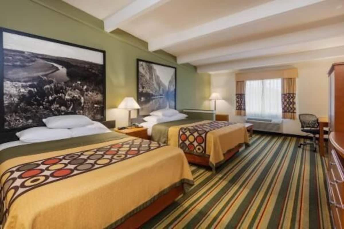 Down comforters, pillowtop beds, in-room safe, desk