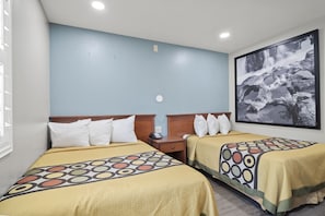 Deluxe Room, 2 Double Beds, Non Smoking | Individually decorated, individually furnished, desk, blackout curtains