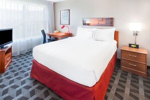 Camas con pillow-top, escritorio y espacio para trabajar con laptop