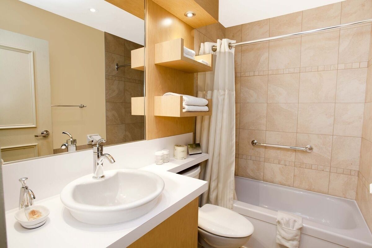 standard room, 2 queen beds | bathroom | eco-friendly toiletries, hair dryer, soap, shampoo