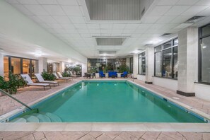 Indoor pool, open 10:00 AM to 10:00 PM, pool loungers