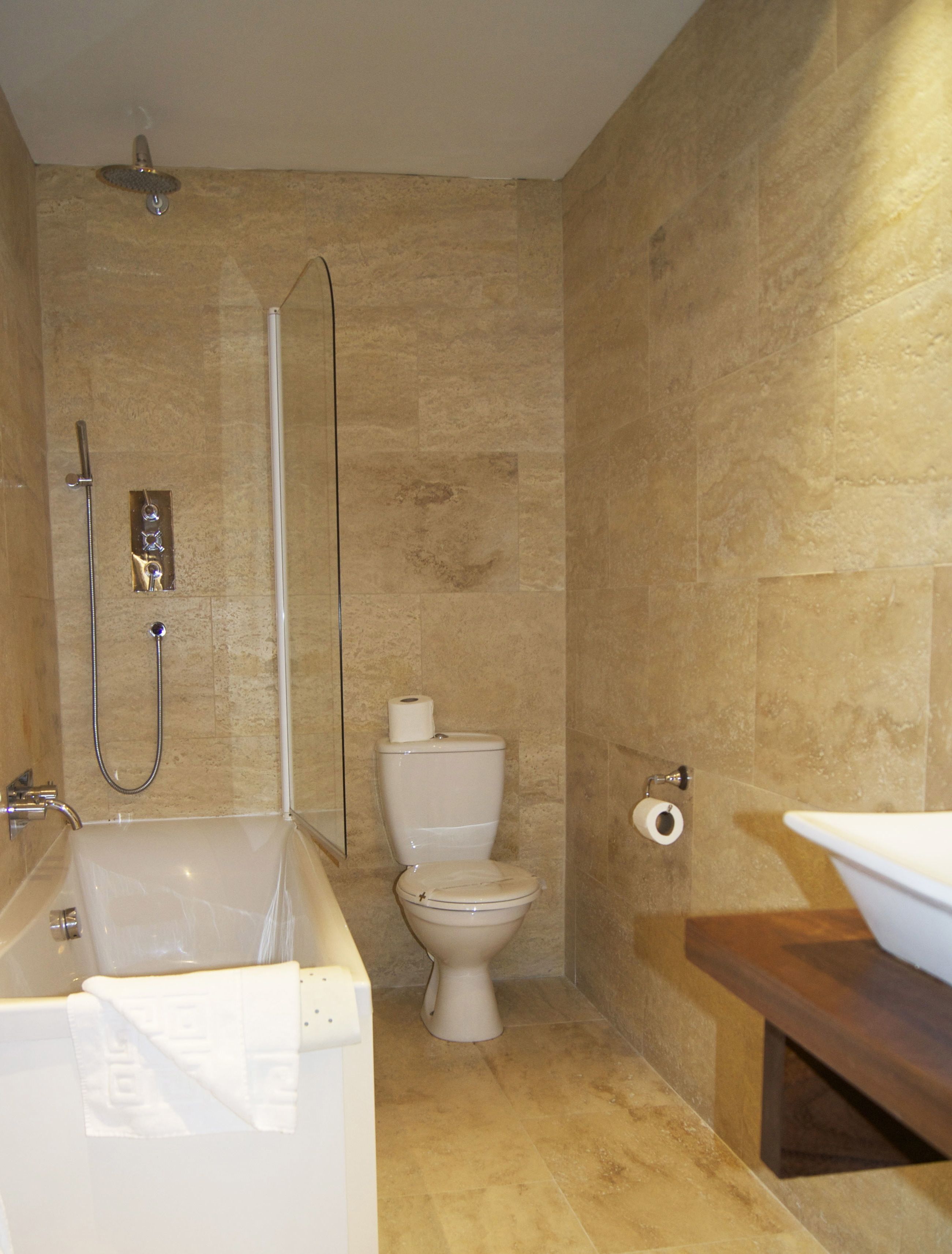 sea view four poster | bathroom | free toiletries, hair dryer, towels