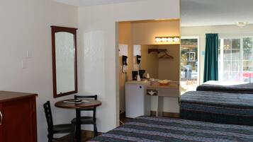 Desk, laptop workspace, blackout curtains, free WiFi