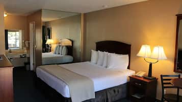 Desk, laptop workspace, blackout curtains, free WiFi