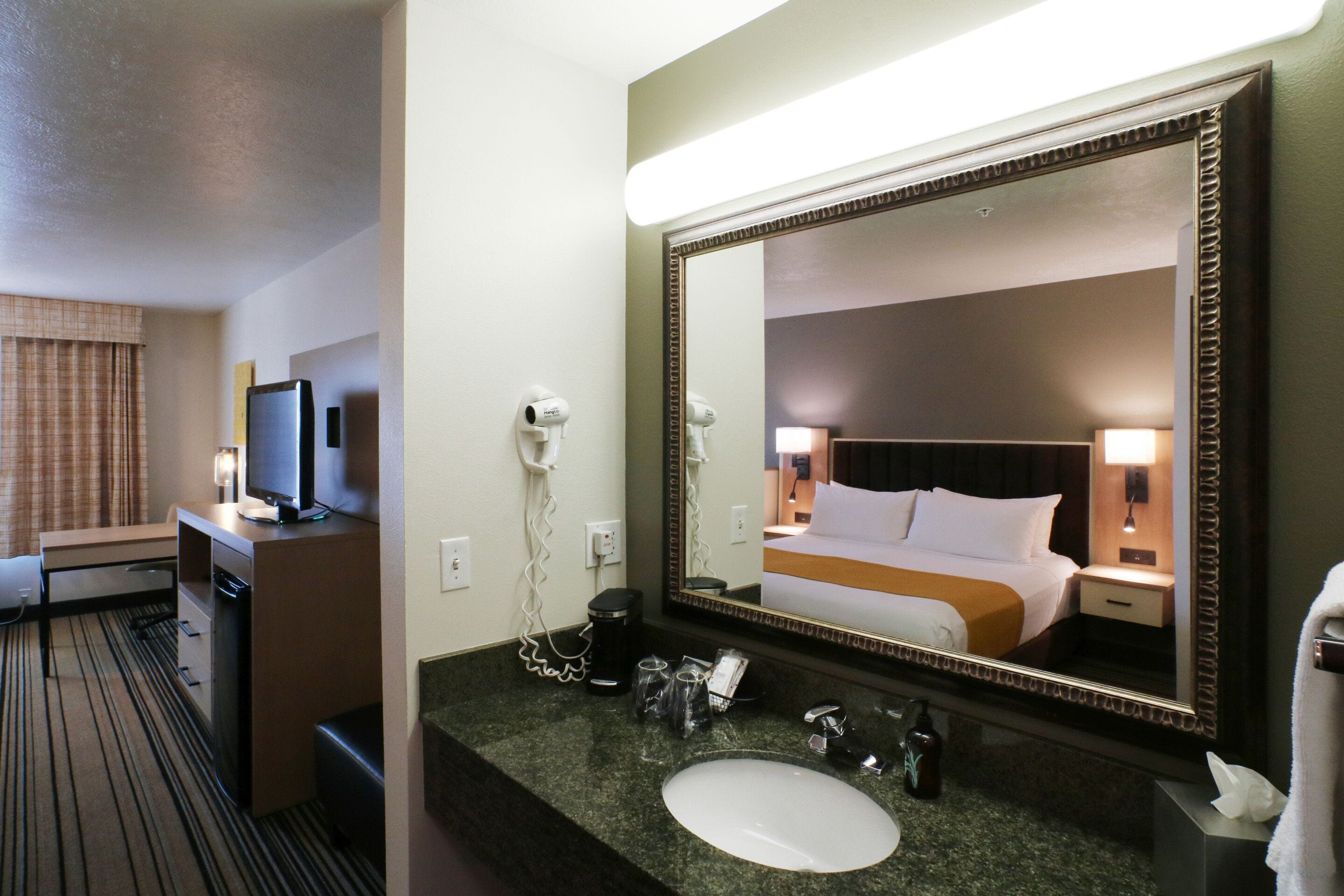 river side king suite sleeper sofa | premium bedding, in-room safe, desk, blackout curtains