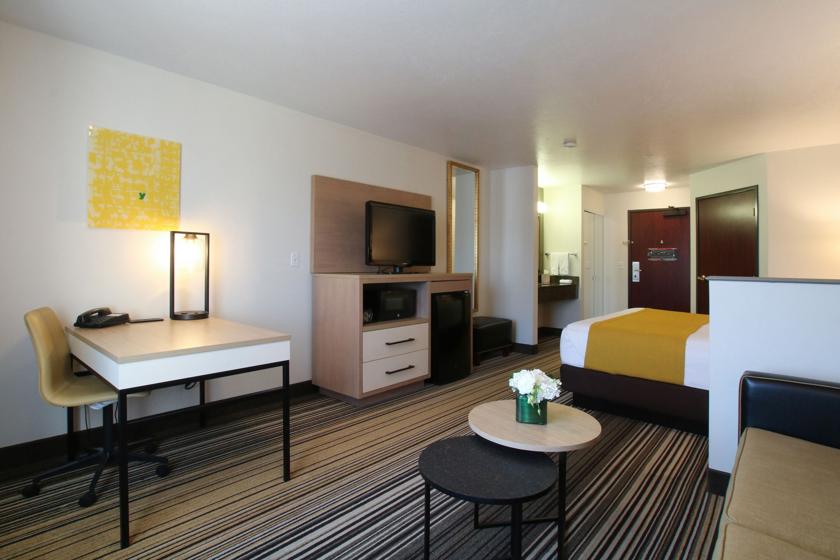 river side king suite sleeper sofa | premium bedding, in-room safe, desk, blackout curtains