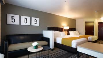 Family 1 King 2 Queen Suite | Premium bedding, in-room safe, desk, blackout drapes
