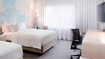 Hypo-allergenic bedding, pillowtop beds, desk, laptop workspace
