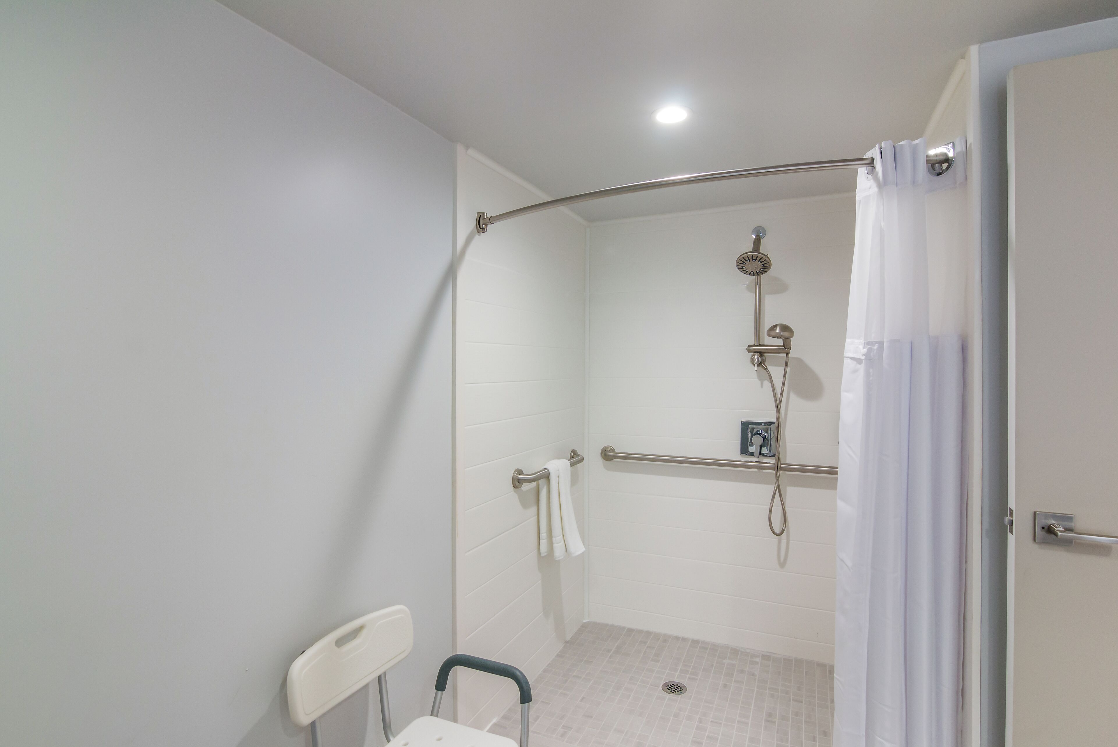 room, 1 king bed, mobility accessible, non smoking (hearing, roll-in shower) | bathroom | designer toiletries, hair dryer, towels