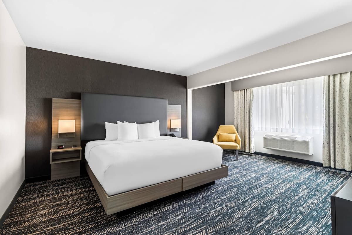Two Room King Suite | Pillowtop beds, desk, laptop workspace, blackout drapes