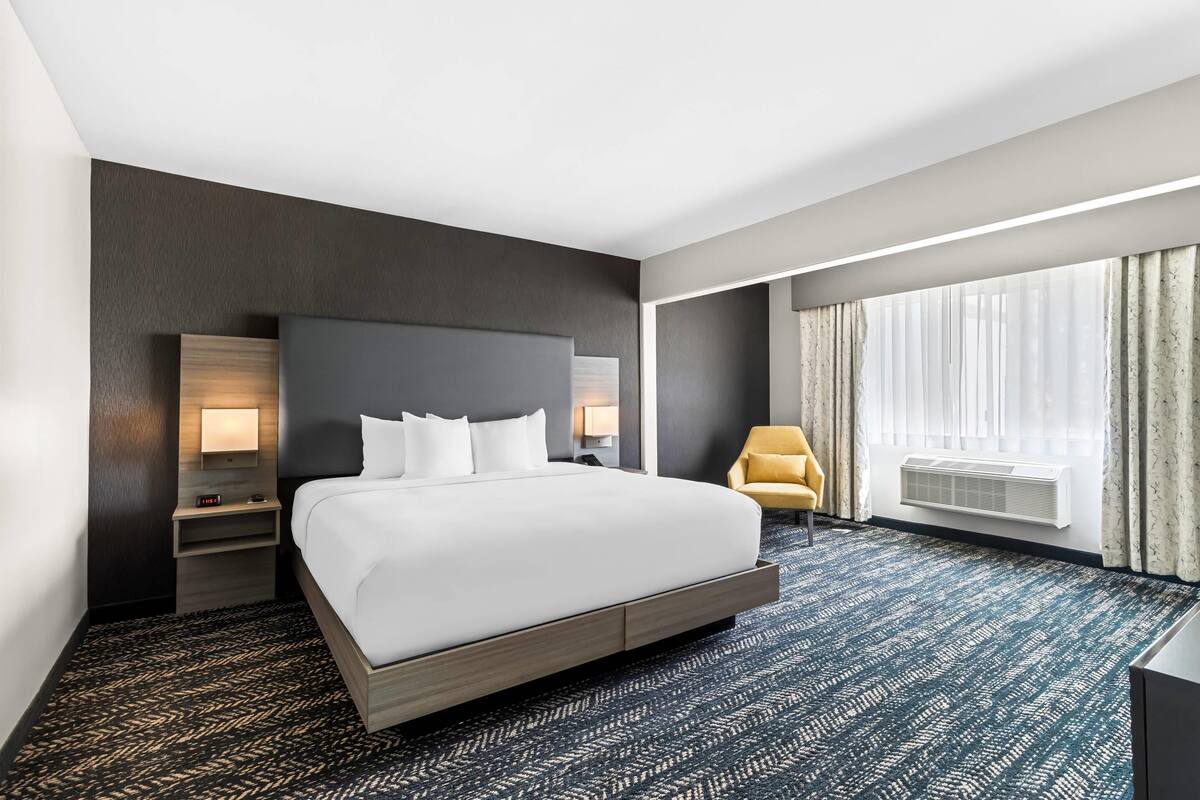Two Room King Suite | Pillowtop beds, desk, laptop workspace, blackout drapes