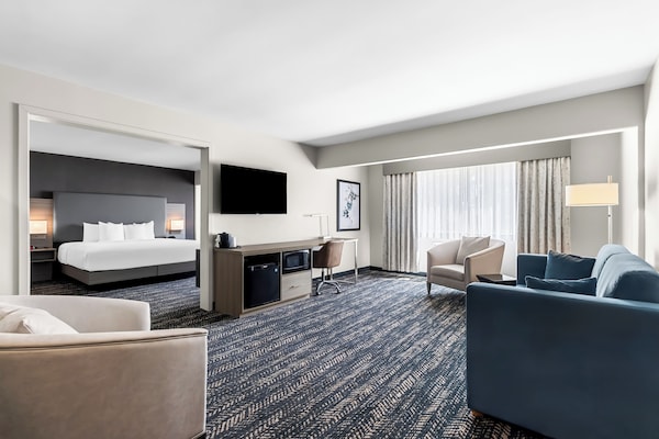 Premium bedding, pillow-top beds, desk, laptop workspace