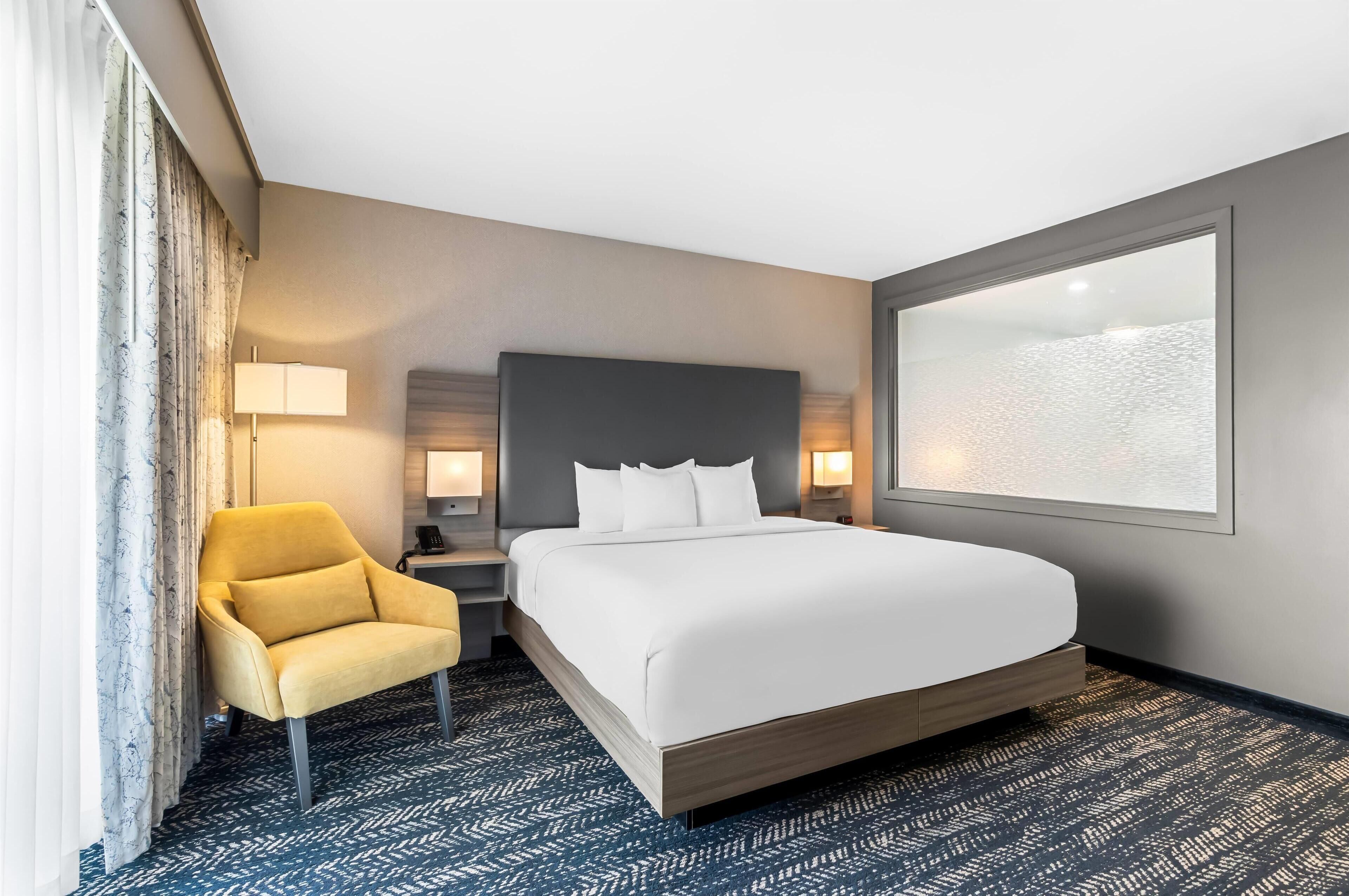Premium bedding, pillowtop beds, desk, laptop workspace
