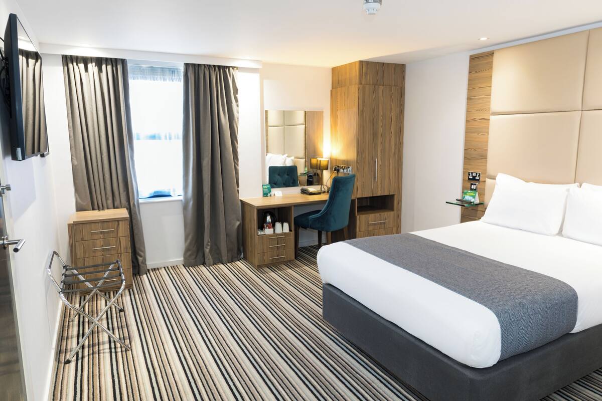 Standaard kamer, 1 tweepersoonsbed, toegankelijk voor mindervaliden | Een bureau, gratis babybedden, gratis wifi, beddengoed
