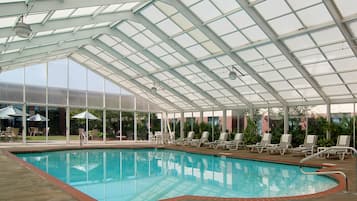 Indoor pool, open noon to 8:00 PM, pool loungers
