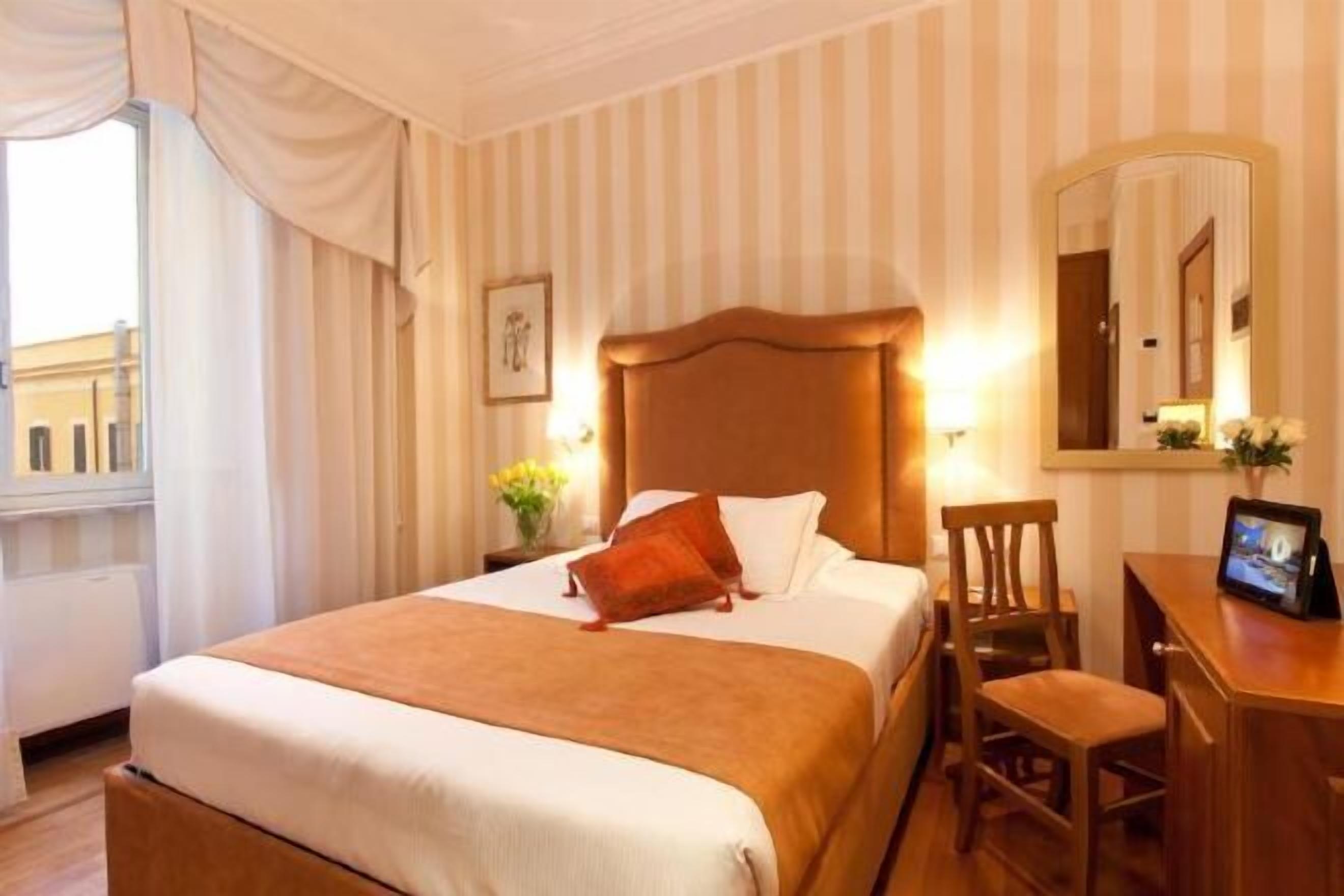 Premium bedding, down comforters, minibar, in-room safe