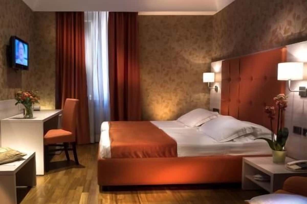 Ropa de cama de alta calidad, edredón y minibar