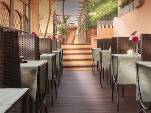 Breakfast, lunch, dinner served; al fresco dining