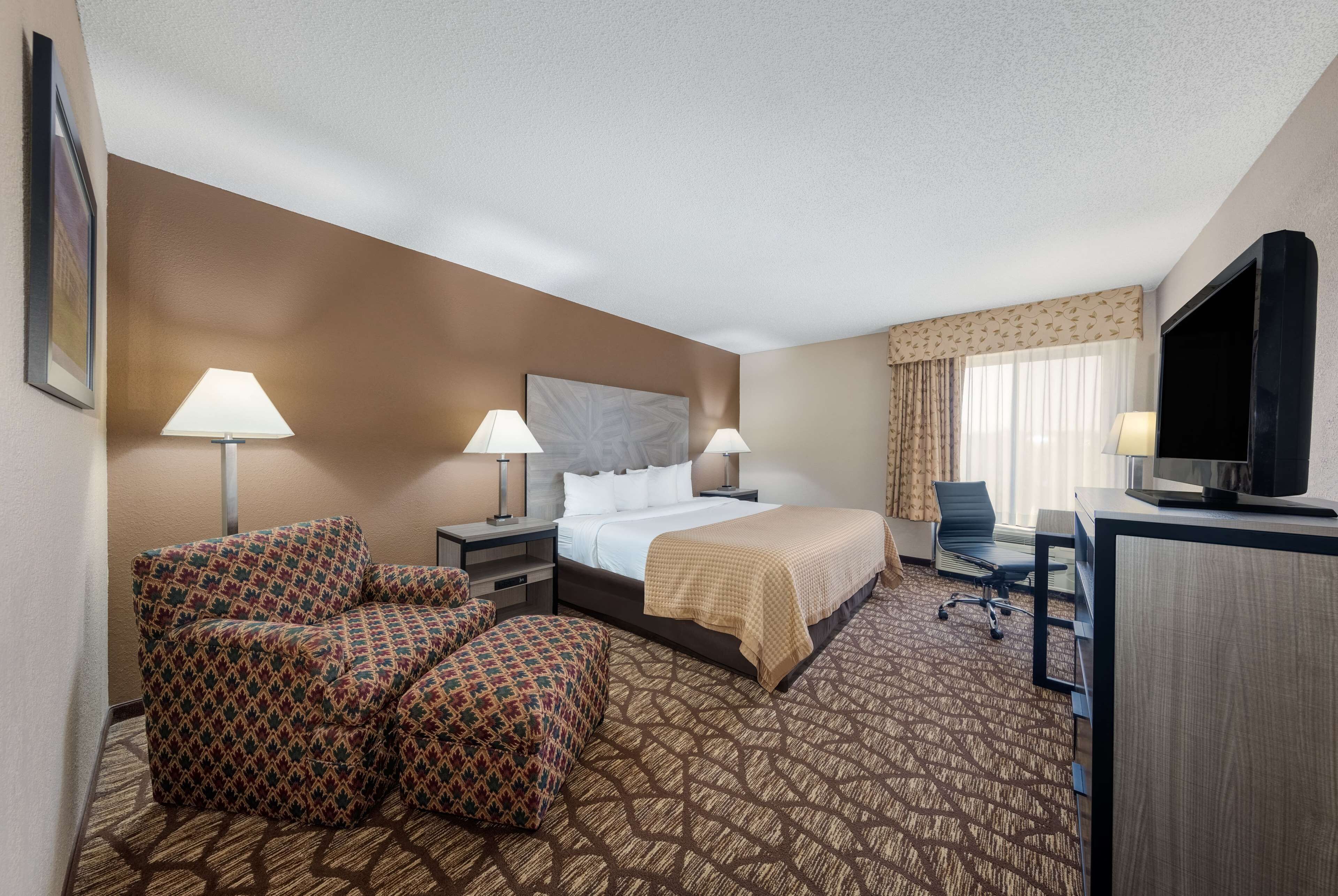 Pillowtop beds, desk, blackout drapes, iron/ironing board