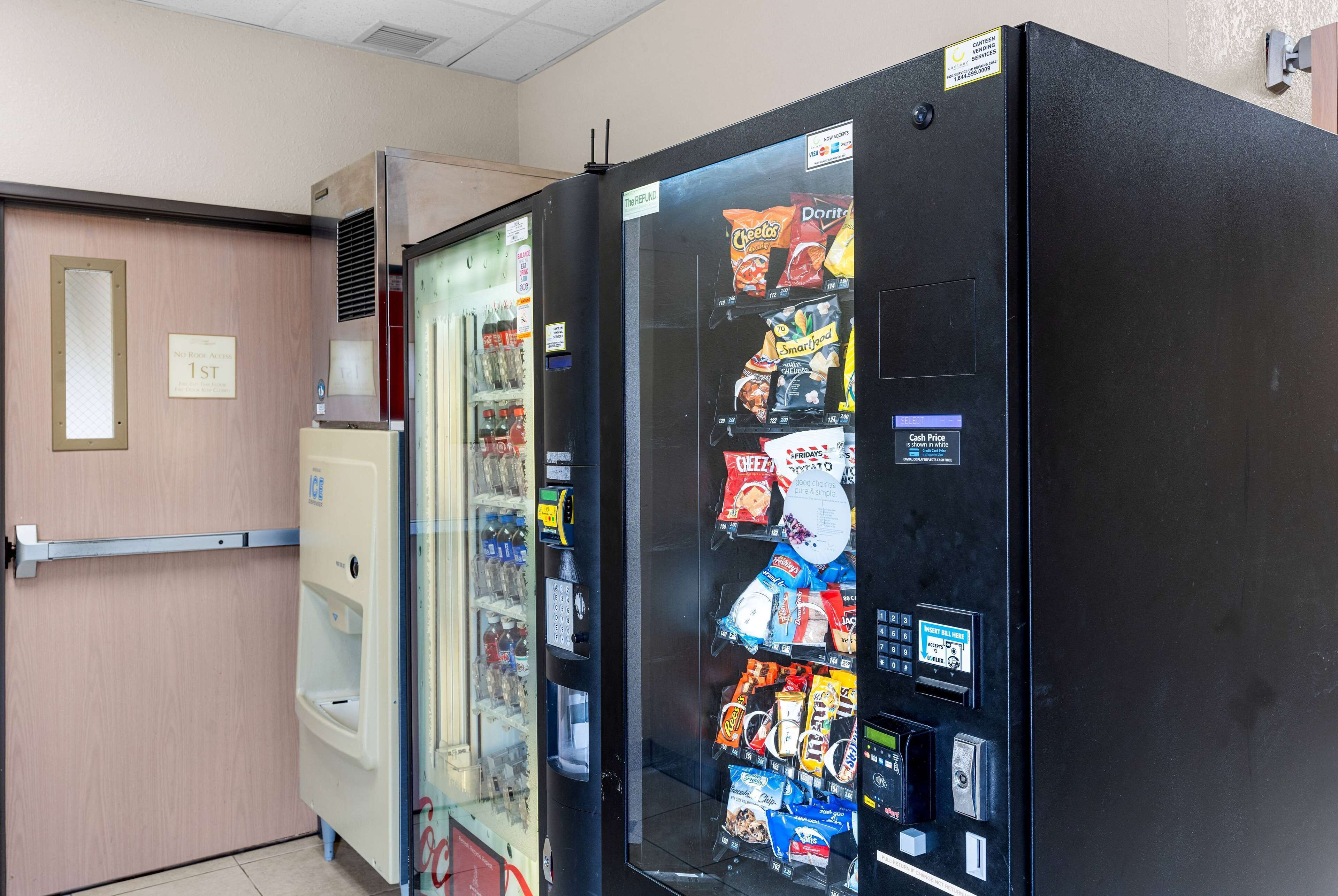 A vending machine with snacks and a water dispenser.