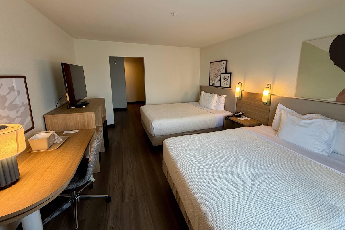 Suite, Non Smoking (2 Queen Beds and 1 Double Sofa Bed) | Premium bedding, desk, blackout drapes, iron/ironing board