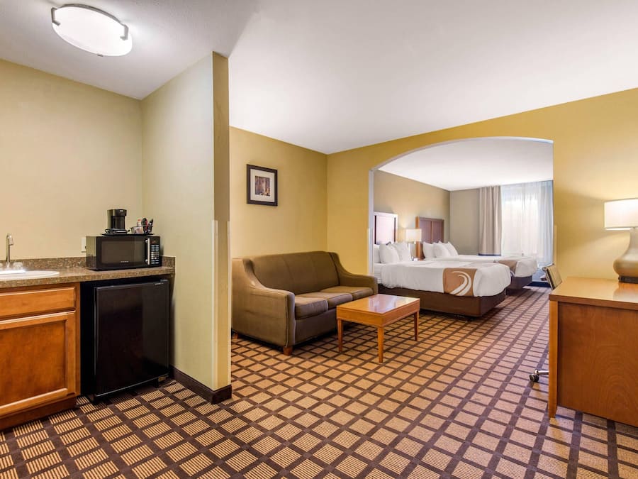 Suite, Non Smoking (2 Queen Beds and 1 Double Sofa Bed) | Premium bedding, desk, blackout curtains, iron/ironing board