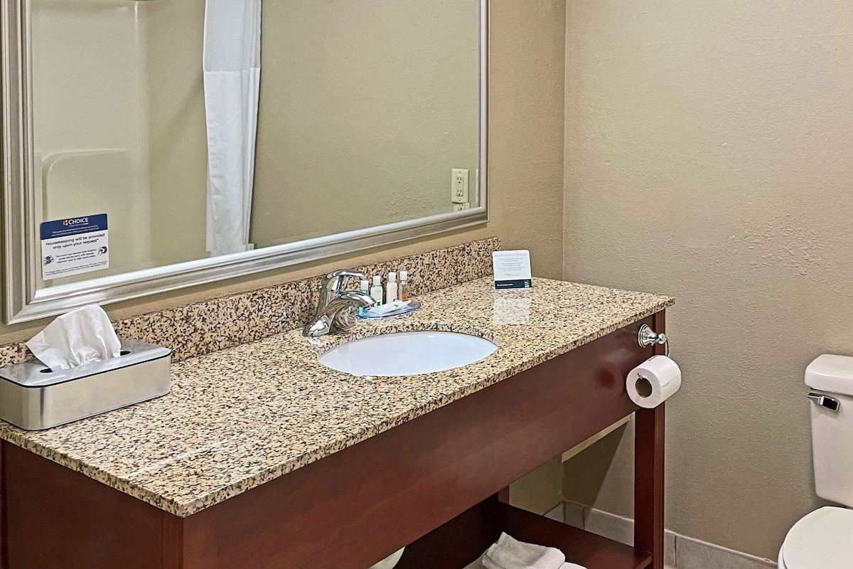 Premium bedding, desk, blackout curtains, iron/ironing board