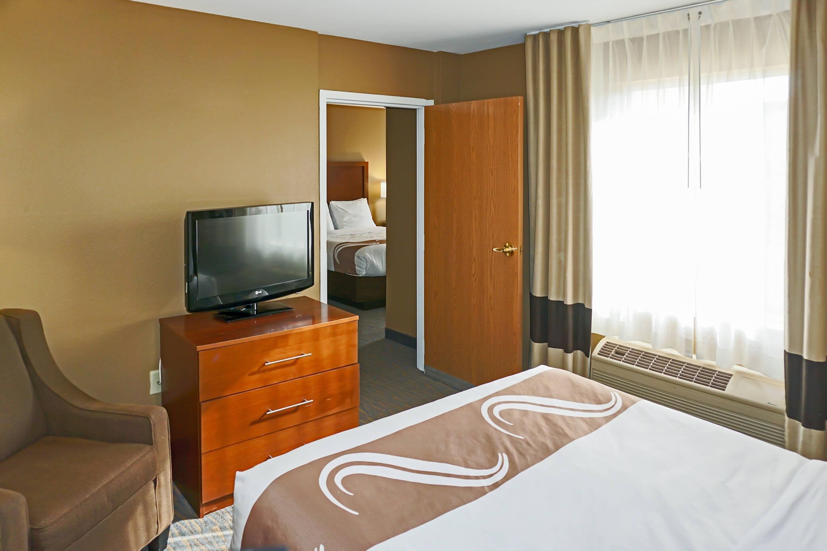 Premium bedding, desk, blackout curtains, iron/ironing board