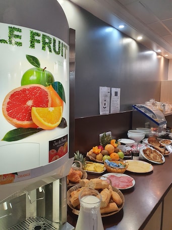 Daily buffet breakfast for a fee. Hotel Restaurant La Chaumiere Les Mureaux - Flins