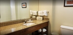Suite, 1 King Bed, Non Smoking | Bathroom | Hair dryer, towels