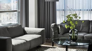 Penthouse, 1 King Bed | Living area | Flat-screen TV, heated floors