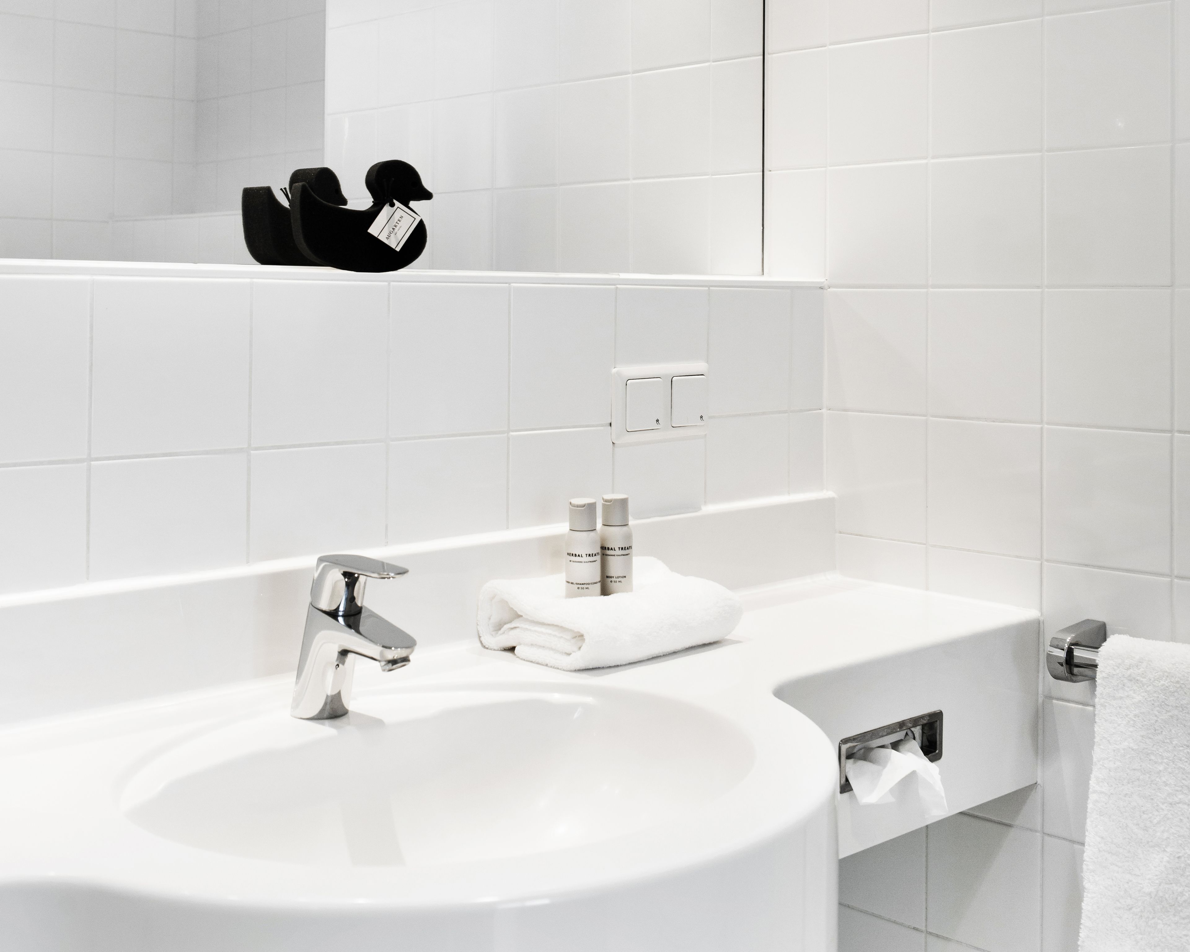 business room | bathroom | designer toiletries, hair dryer, bathrobes, slippers