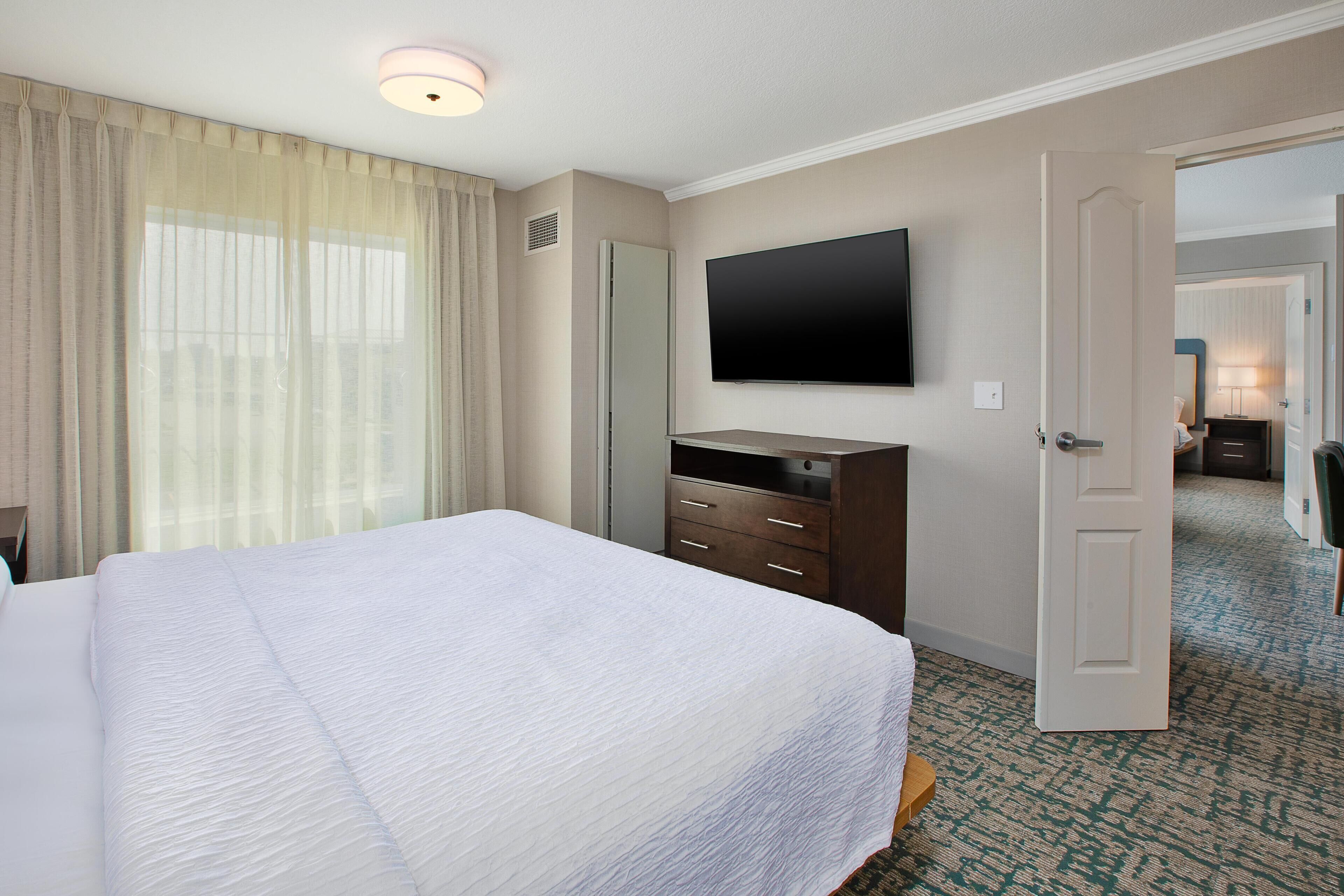 Desk, laptop workspace, blackout curtains, iron/ironing board