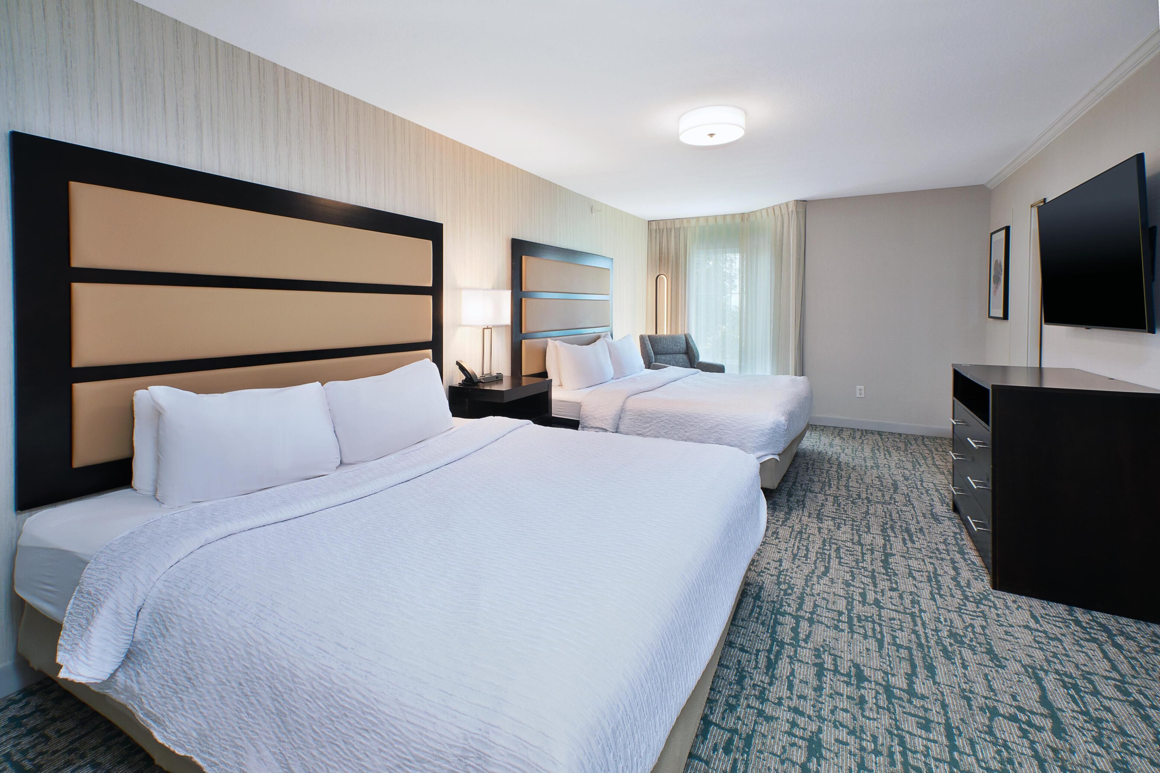 Suite, 1 Bedroom | Desk, laptop workspace, blackout curtains, iron/ironing board