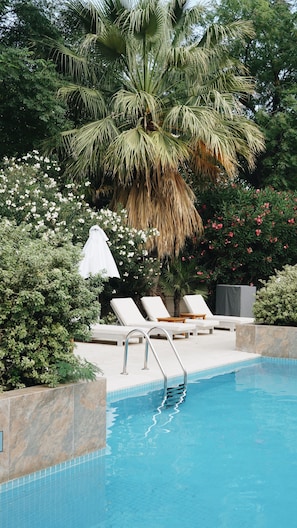 Outdoor pool, pool umbrellas, pool loungers
