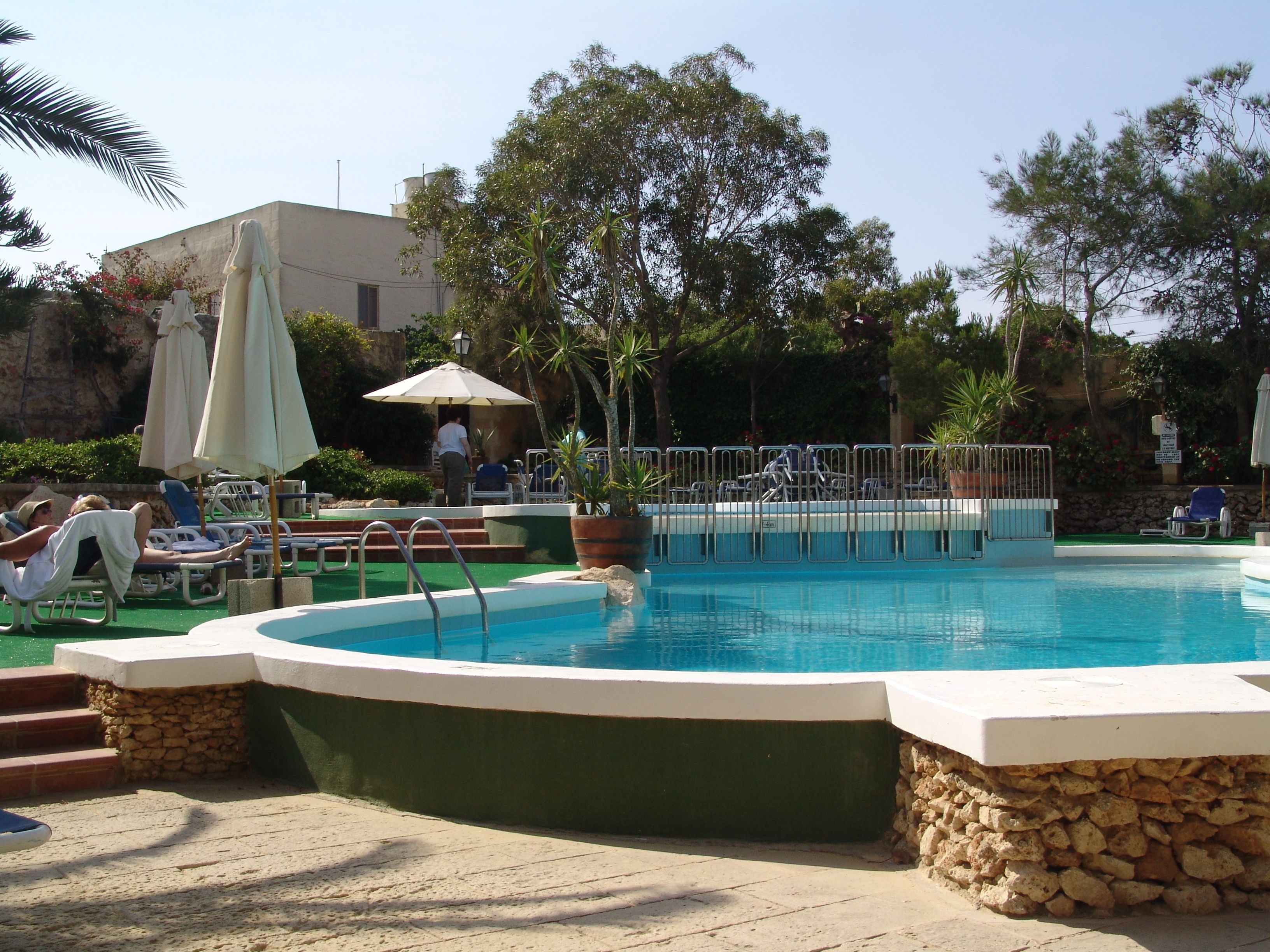 2 outdoor pools, pool umbrellas, pool loungers