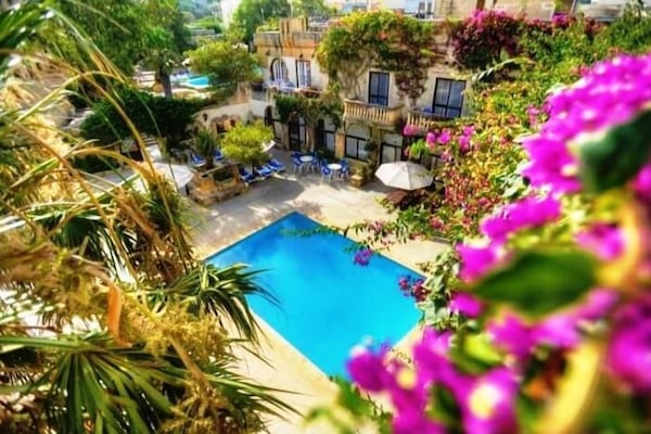 2 outdoor pools, pool umbrellas, sun loungers